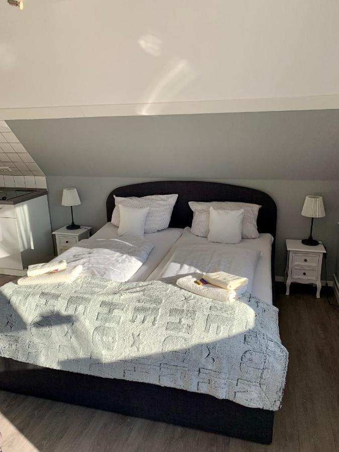 Апартаменты Haus Kaiser Ferienwohnung Und Appartementvermietung Бюзум