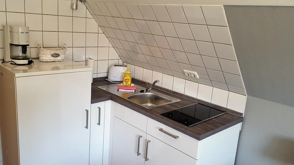 Апартаменты Haus Kaiser Ferienwohnung Und Appartementvermietung Бюзум